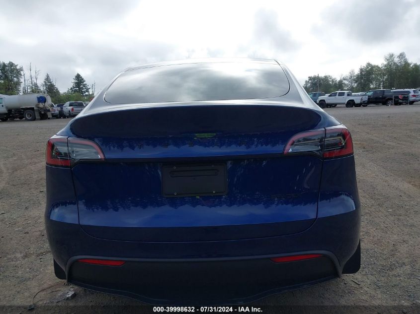 2023 Tesla Model Y Awd/Long Range Dual Motor All-Wheel Drive VIN: 7SAYGDEE3PF915949 Lot: 39998632