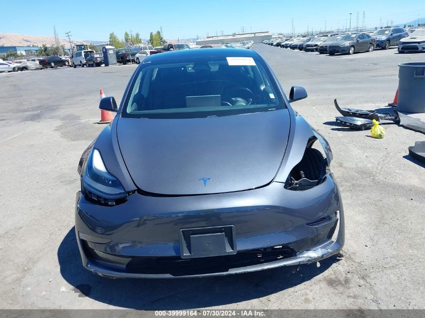 2021 Tesla Model 3 Long Range Dual Motor All-Wheel Drive VIN: 5YJ3E1EB5MF915898 Lot: 39999164