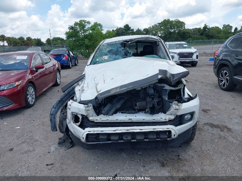 2020 Toyota Tacoma Sr5 V6 VIN: 5TFSZ5AN9LX232341 Lot: 39999372