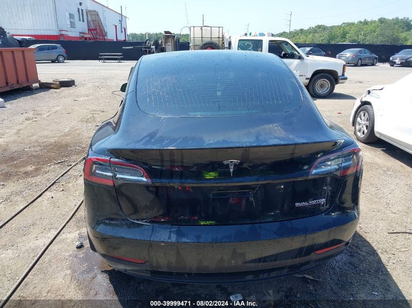 2019 Tesla Model 3 VIN: 5YJ3E1EBXKF385554 Lot: 39999471