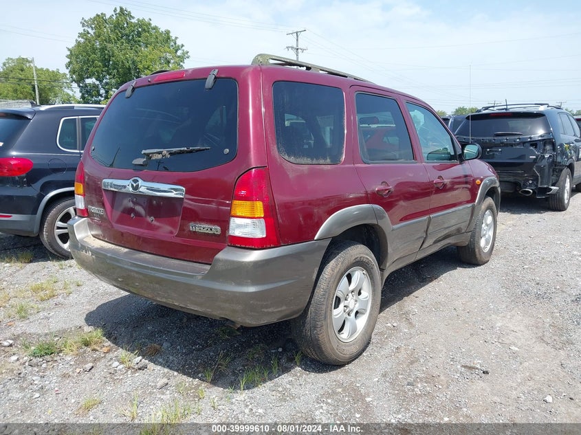 2004 Mazda Tribute Lx V6 VIN: 4F2YZ04174KM09943 Lot: 39999610
