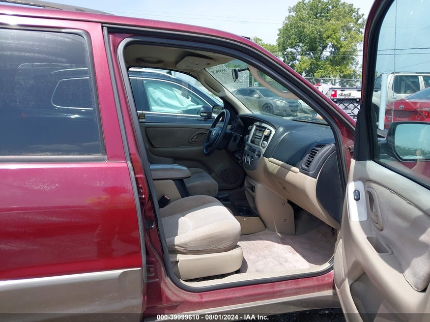 2004 Mazda Tribute Lx V6 VIN: 4F2YZ04174KM09943 Lot: 39999610