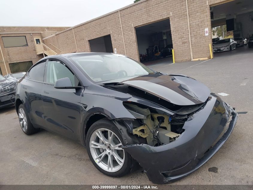 2023 Tesla Model Y Awd/Long Range Dual Motor All-Wheel Drive VIN: 7SAYGDEE8PF825728 Lot: 39999897