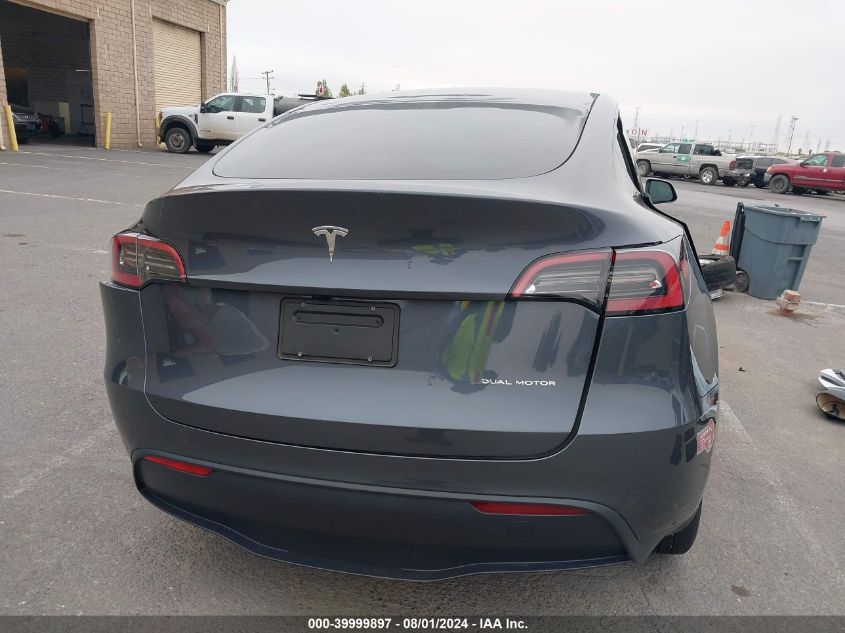 2023 Tesla Model Y Awd/Long Range Dual Motor All-Wheel Drive VIN: 7SAYGDEE8PF825728 Lot: 39999897