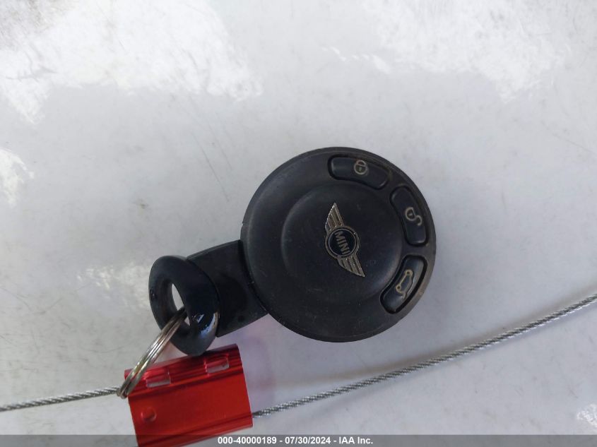 2010 Mini Cooper VIN: WMWMF3C51ATU77333 Lot: 40000189