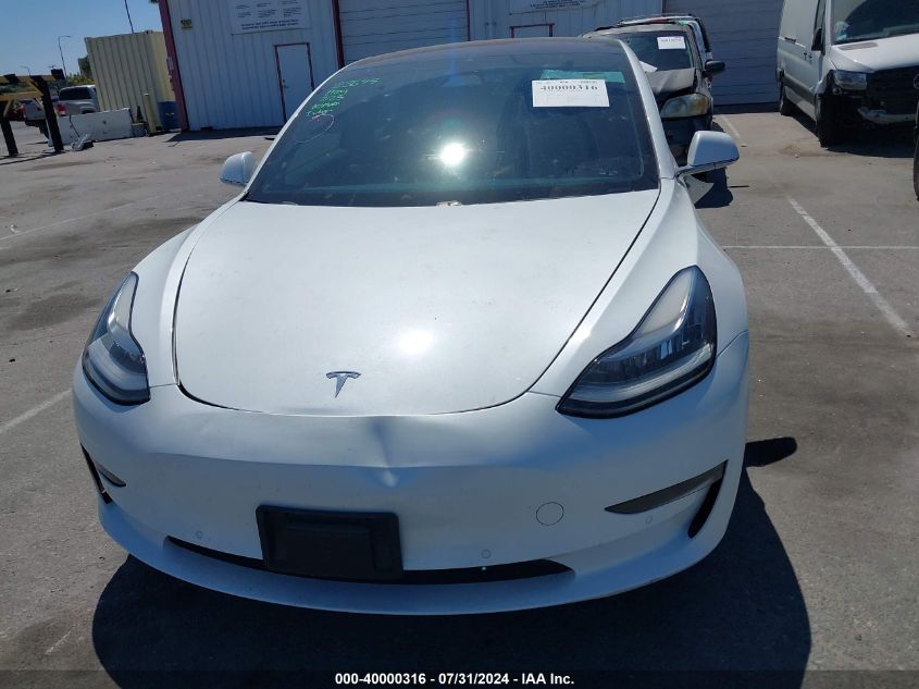 2018 Tesla Model 3 Long Range/Mid Range VIN: 5YJ3E1EA9JF046001 Lot: 40000316