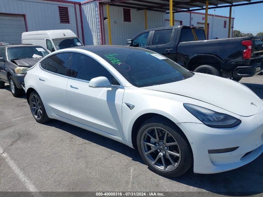 2018 Tesla Model 3 Long Range/Mid Range VIN: 5YJ3E1EA9JF046001 Lot: 40000316