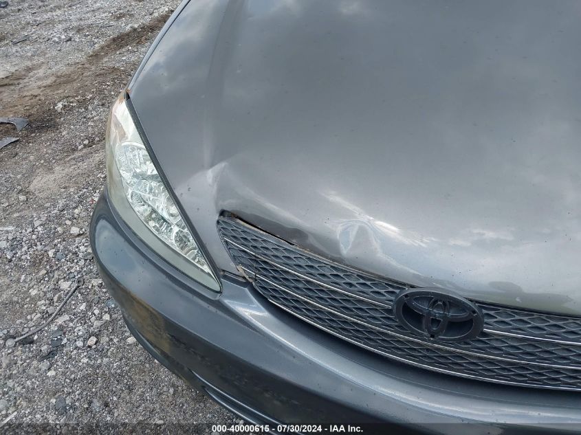 2003 Toyota Camry Le V6 VIN: 4T1BF30KX3U566640 Lot: 40000615