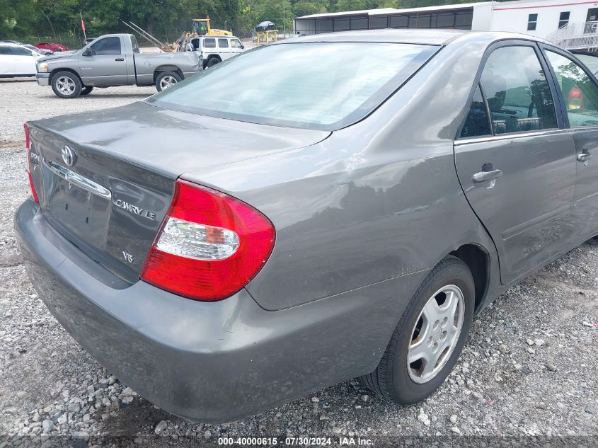 2003 Toyota Camry Le V6 VIN: 4T1BF30KX3U566640 Lot: 40000615