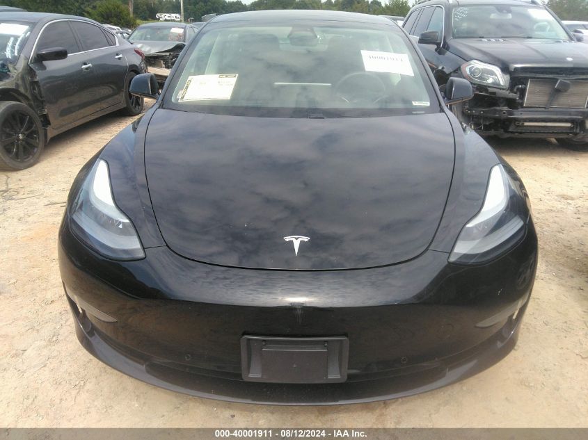 2021 Tesla Model 3 Standard Range Plus Rear-Wheel Drive VIN: 5YJ3E1EA4MF058450 Lot: 40001911