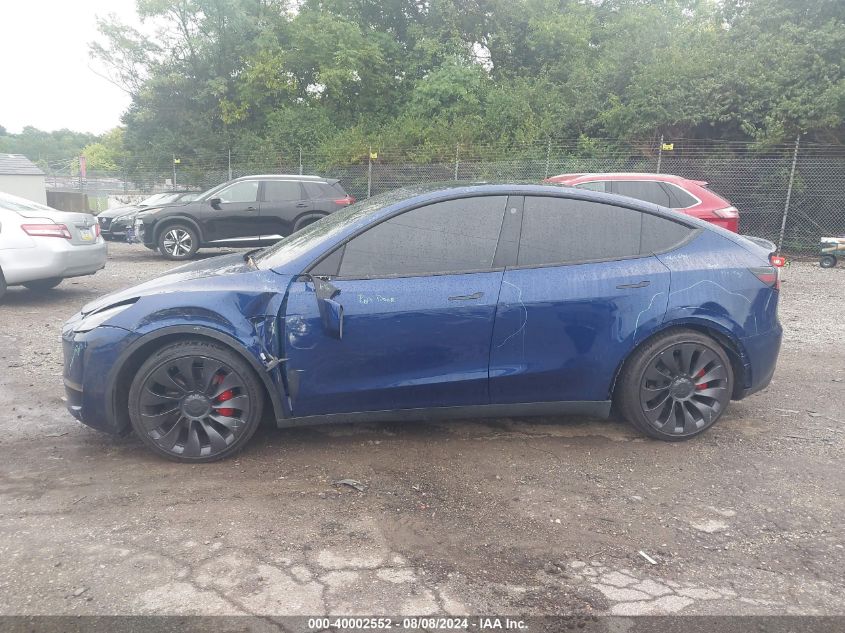 2023 Tesla Model Y VIN: 7SAYGDEF1PF707092 Lot: 40002552