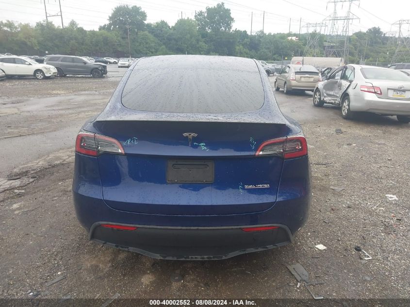 2023 Tesla Model Y VIN: 7SAYGDEF1PF707092 Lot: 40002552