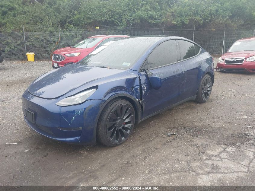 2023 Tesla Model Y VIN: 7SAYGDEF1PF707092 Lot: 40002552