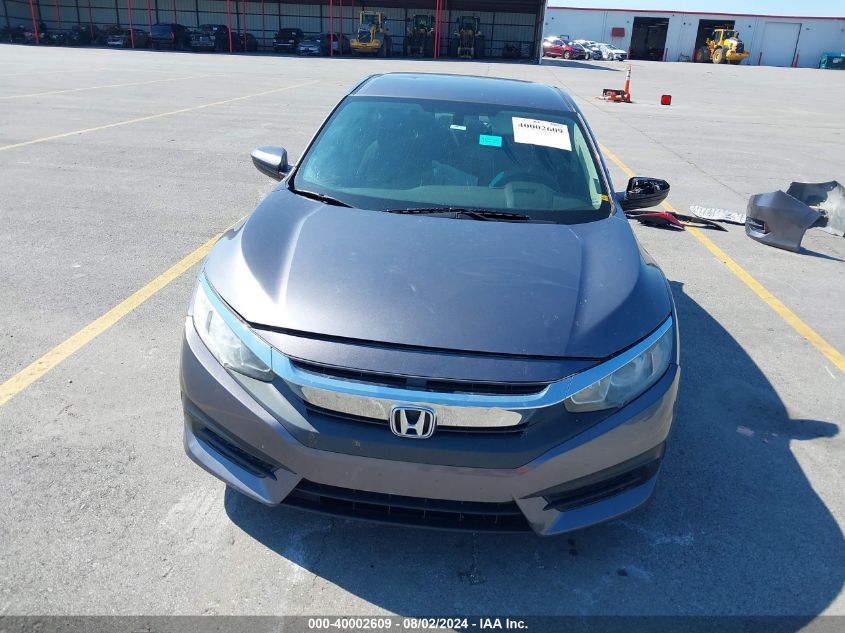 2018 Honda Civic Lx VIN: 19XFC2F53JE018596 Lot: 40002609