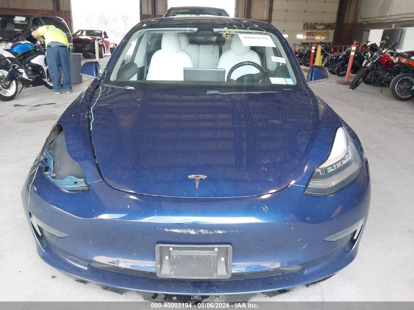 2018 Tesla Model 3 Long Range/Performance VIN: 5YJ3E1EB2JF097736 Lot: 40003194