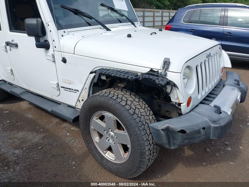 2012 Jeep Wrangler Unlimited Sahara VIN: 1C4HJWEG1CL154213 Lot: 40003548