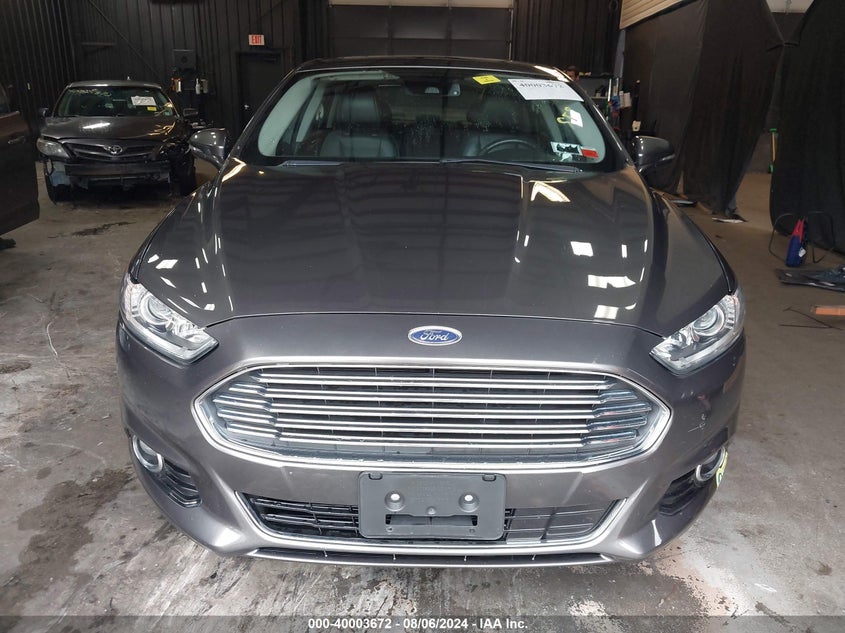 2016 Ford Fusion Energi Titanium VIN: 3FA6P0SU6GR373453 Lot: 40003672