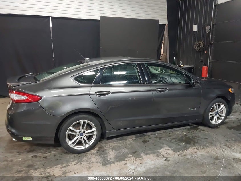 2016 Ford Fusion Energi Titanium VIN: 3FA6P0SU6GR373453 Lot: 40003672