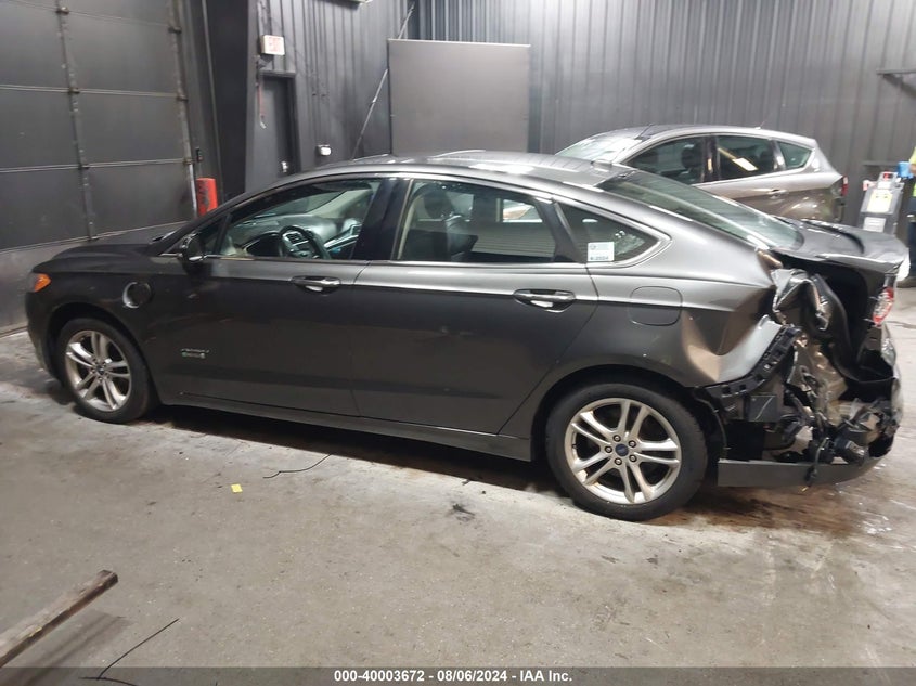 2016 Ford Fusion Energi Titanium VIN: 3FA6P0SU6GR373453 Lot: 40003672