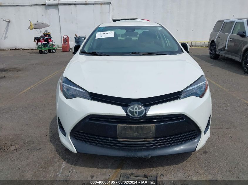 2017 Toyota Corolla Le VIN: 5YFBURHE8HP605340 Lot: 40005195