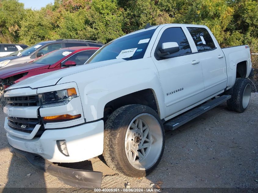 2018 Chevrolet Silverado 1500 2Lt VIN: 3GCUKREC2JG316354 Lot: 40005361