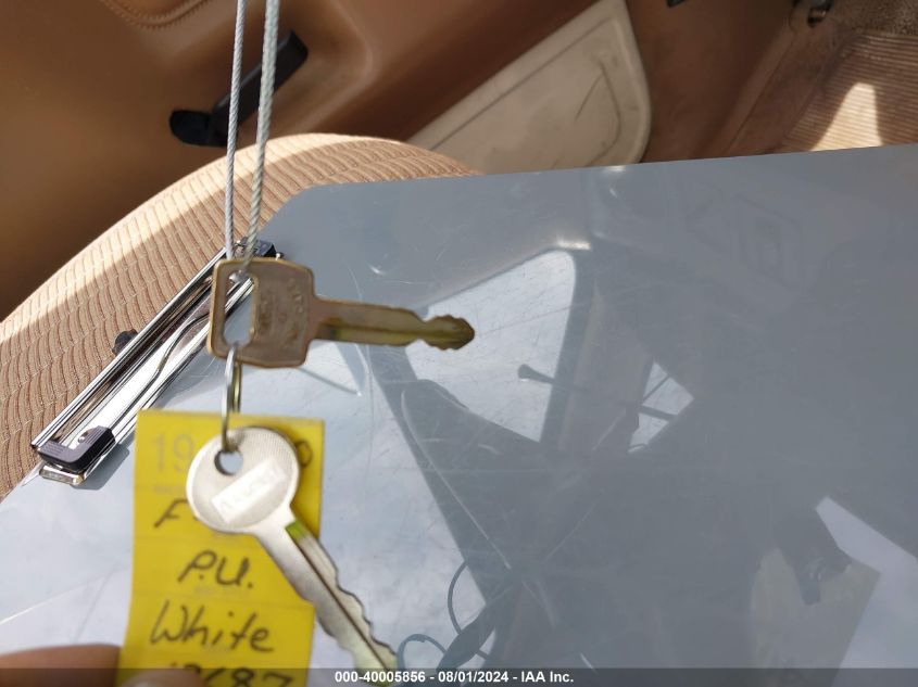 1990 Ford F150 VIN: 1FTDF15Y7LPB49716 Lot: 40005856