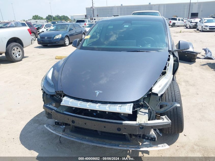 2023 Tesla Model Y Awd/Long Range Dual Motor All-Wheel Drive VIN: 7SAYGAEE9PF673635 Lot: 40008652