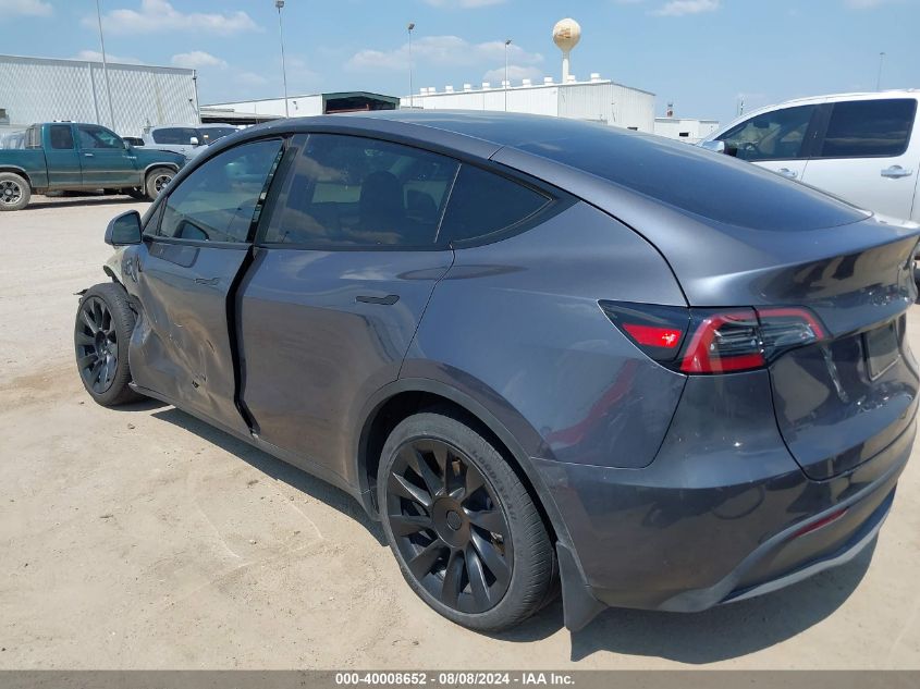 2023 Tesla Model Y Awd/Long Range Dual Motor All-Wheel Drive VIN: 7SAYGAEE9PF673635 Lot: 40008652