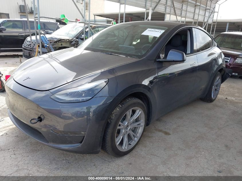 2023 Tesla Model Y VIN: LRWYGDEE9PC032087 Lot: 40009014