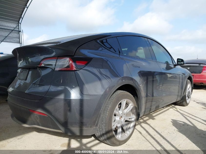 2023 Tesla Model Y VIN: LRWYGDEE9PC032087 Lot: 40009014