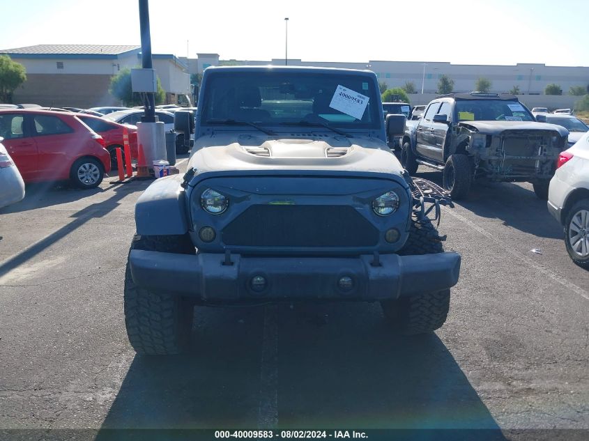 2015 Jeep Wrangler Sahara VIN: 1C4GJWBG4FL528317 Lot: 40009583