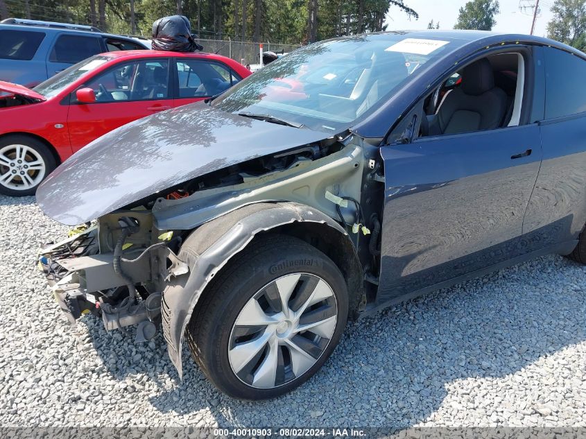 2023 Tesla Model Y Awd/Long Range Dual Motor All-Wheel Drive VIN: 7SAYGDEE3PF757659 Lot: 40010903