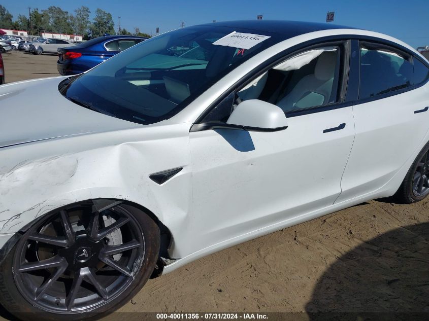 2022 Tesla Model 3 Long Range Dual Motor All-Wheel Drive VIN: 5YJ3E1EB1NF278638 Lot: 40011356