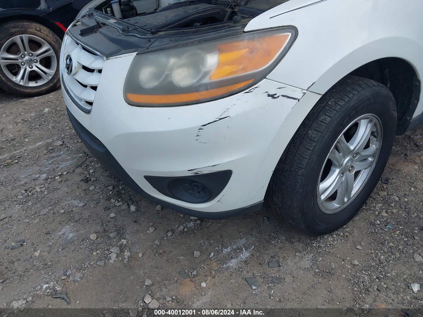 2010 HYUNDAI SANTA FE VIN: 1FMCU9GX8FUC38703