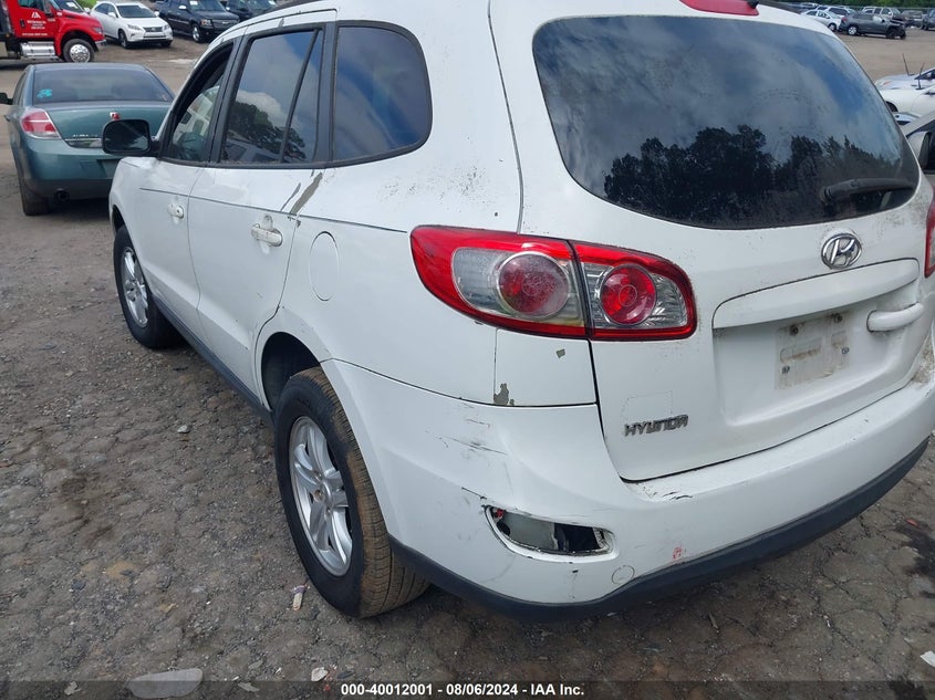 2010 HYUNDAI SANTA FE VIN: 1FMCU9GX8FUC38703