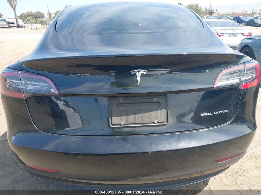 2021 Tesla Model 3 Long Range Dual Motor All-Wheel Drive VIN: 5YJ3E1EB7MF939880 Lot: 40012735