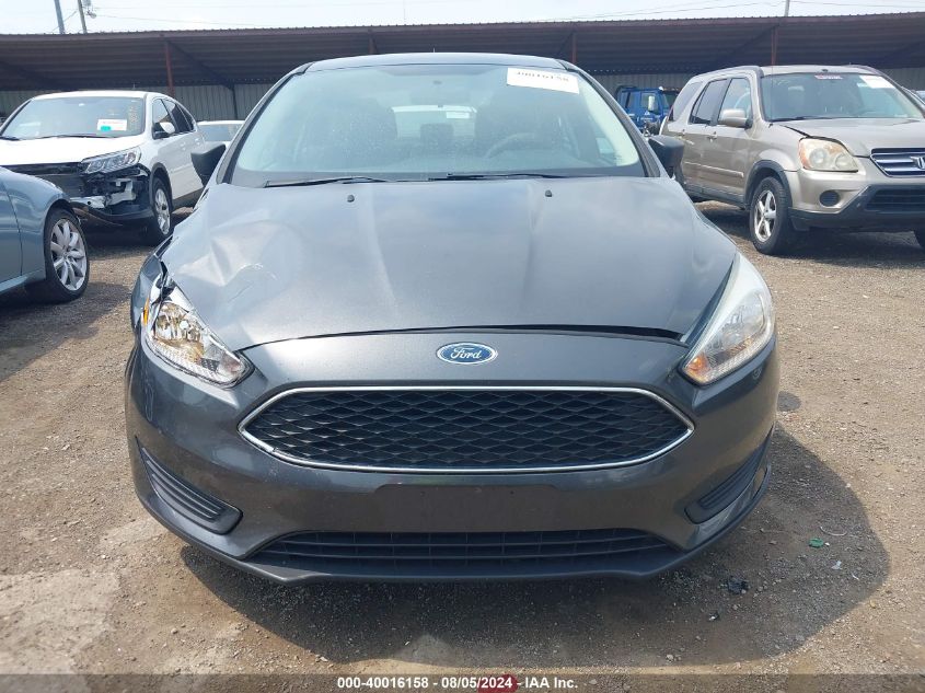 2016 Ford Focus S VIN: 1FADP3E27GL394569 Lot: 40016158