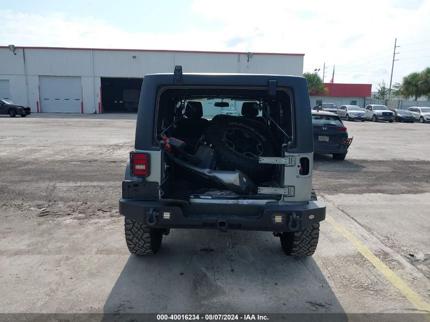 2014 Jeep Wrangler Unlimited Sport VIN: 1C4BJWDG7EL100909 Lot: 40016234