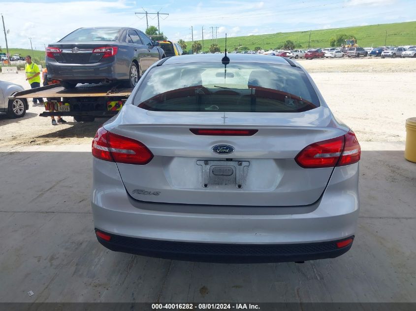 2018 Ford Focus S VIN: 1FADP3E23JL284898 Lot: 40016282