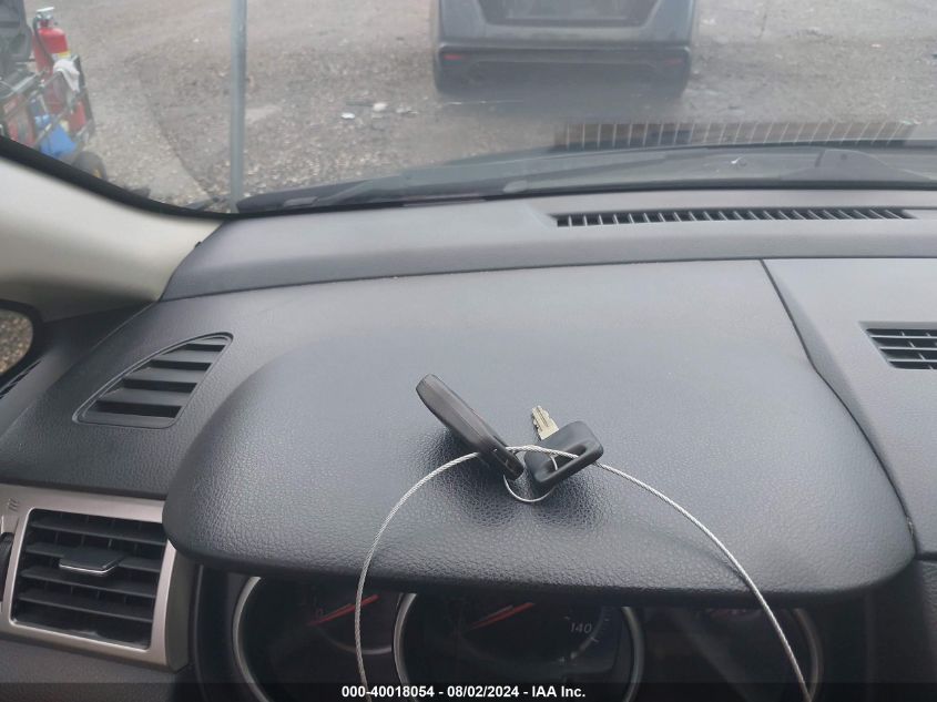 2010 Nissan Versa 1.8Sl VIN: 3N1BC1CP7AL380217 Lot: 40018054