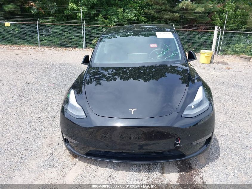 2023 Tesla Model Y Awd/Long Range Dual Motor All-Wheel Drive VIN: 7SAYGDEE9PF663298 Lot: 40018338