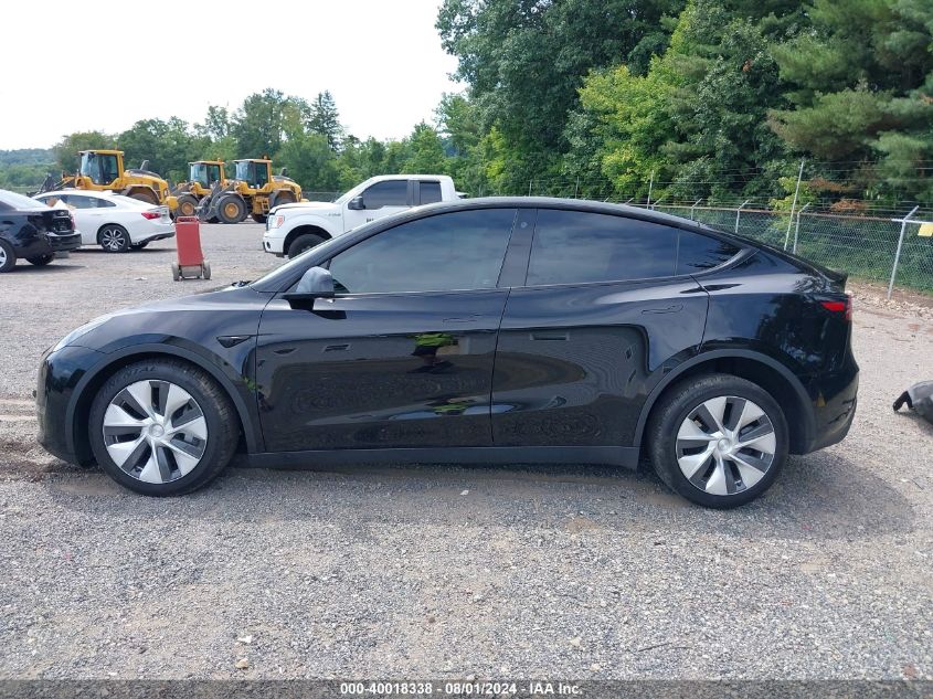 2023 Tesla Model Y Awd/Long Range Dual Motor All-Wheel Drive VIN: 7SAYGDEE9PF663298 Lot: 40018338