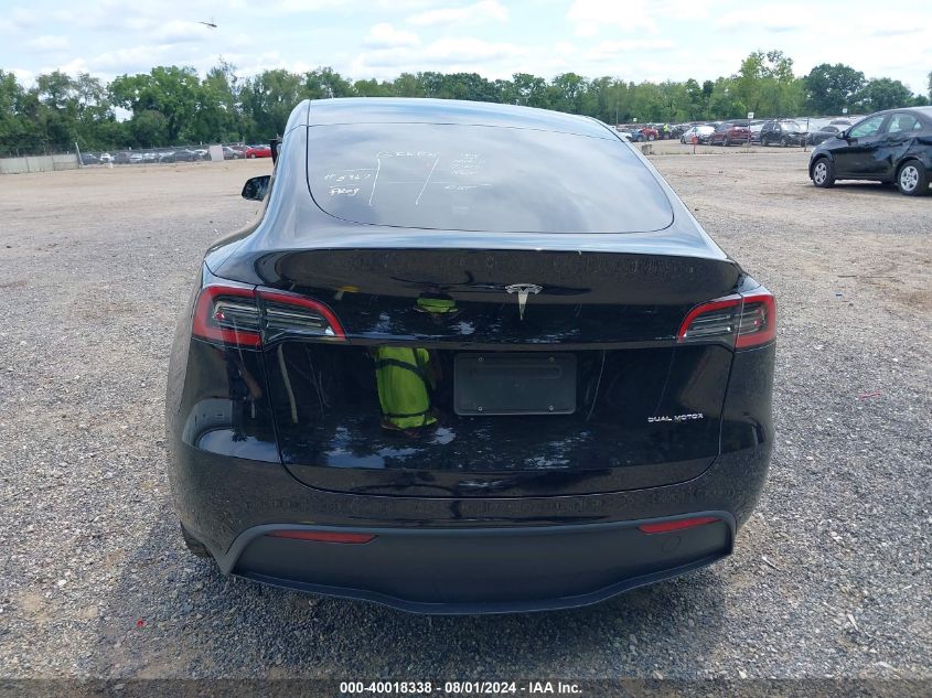 2023 Tesla Model Y Awd/Long Range Dual Motor All-Wheel Drive VIN: 7SAYGDEE9PF663298 Lot: 40018338