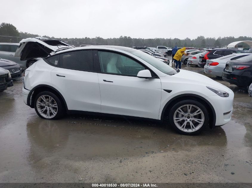 2023 Tesla Model Y Awd/Long Range Dual Motor All-Wheel Drive VIN: 7SAYGDEE2PF789020 Lot: 40018530