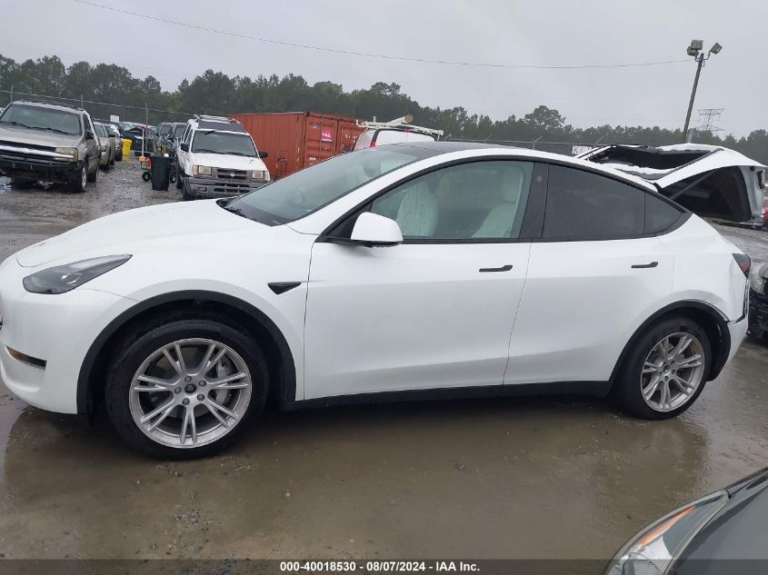 2023 Tesla Model Y Awd/Long Range Dual Motor All-Wheel Drive VIN: 7SAYGDEE2PF789020 Lot: 40018530