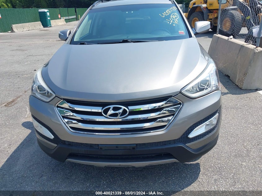 2014 Hyundai Santa Fe Sport 2.4L VIN: 5XYZUDLB7EG217949 Lot: 40021339