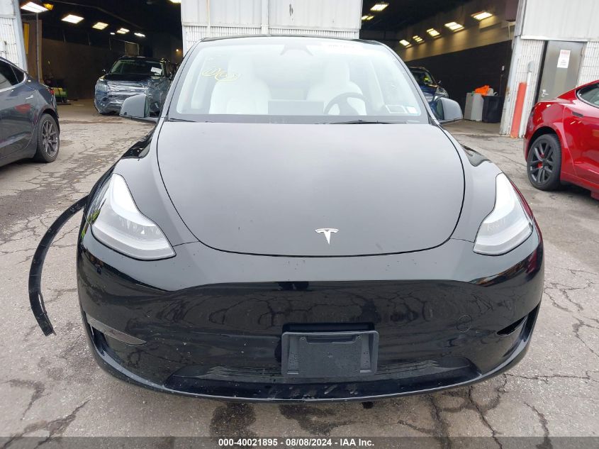 2023 Tesla Model Y VIN: 7SAYGDEF8PF967702 Lot: 40021895