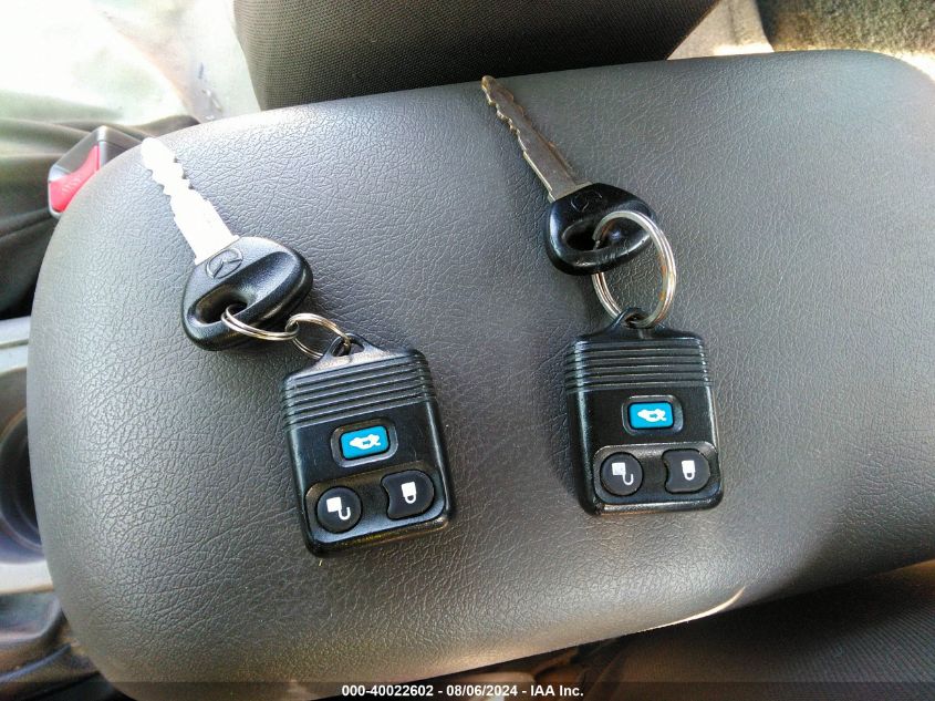 1999 Mazda 626 Es/Lx VIN: 1YVGF22D6X5866768 Lot: 40022602