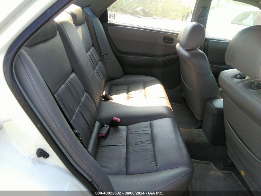 1999 Mazda 626 Es/Lx VIN: 1YVGF22D6X5866768 Lot: 40022602