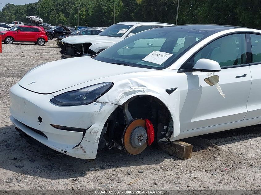 2023 Tesla Model 3 Performance Dual Motor All-Wheel Drive VIN: 5YJ3E1EC0PF472038 Lot: 40022687